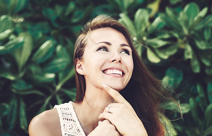 Woman awake and refreshed thanks to sleep apnea treatment