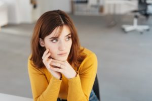 young woman looking concerned